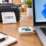 Zebra label printer driver USB drive plugged into a laptop
