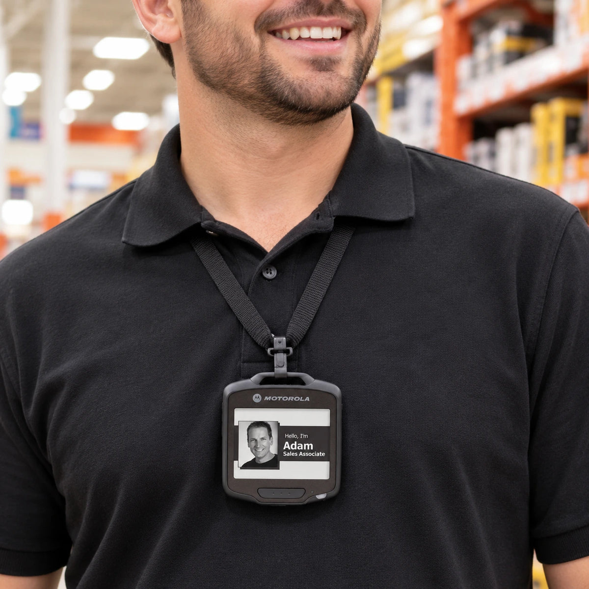 Zebra SB1 smart badge worn by a retail associate