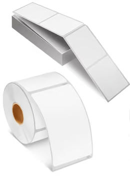 Fanfold labels in a box beside a roll of direct thermal labels